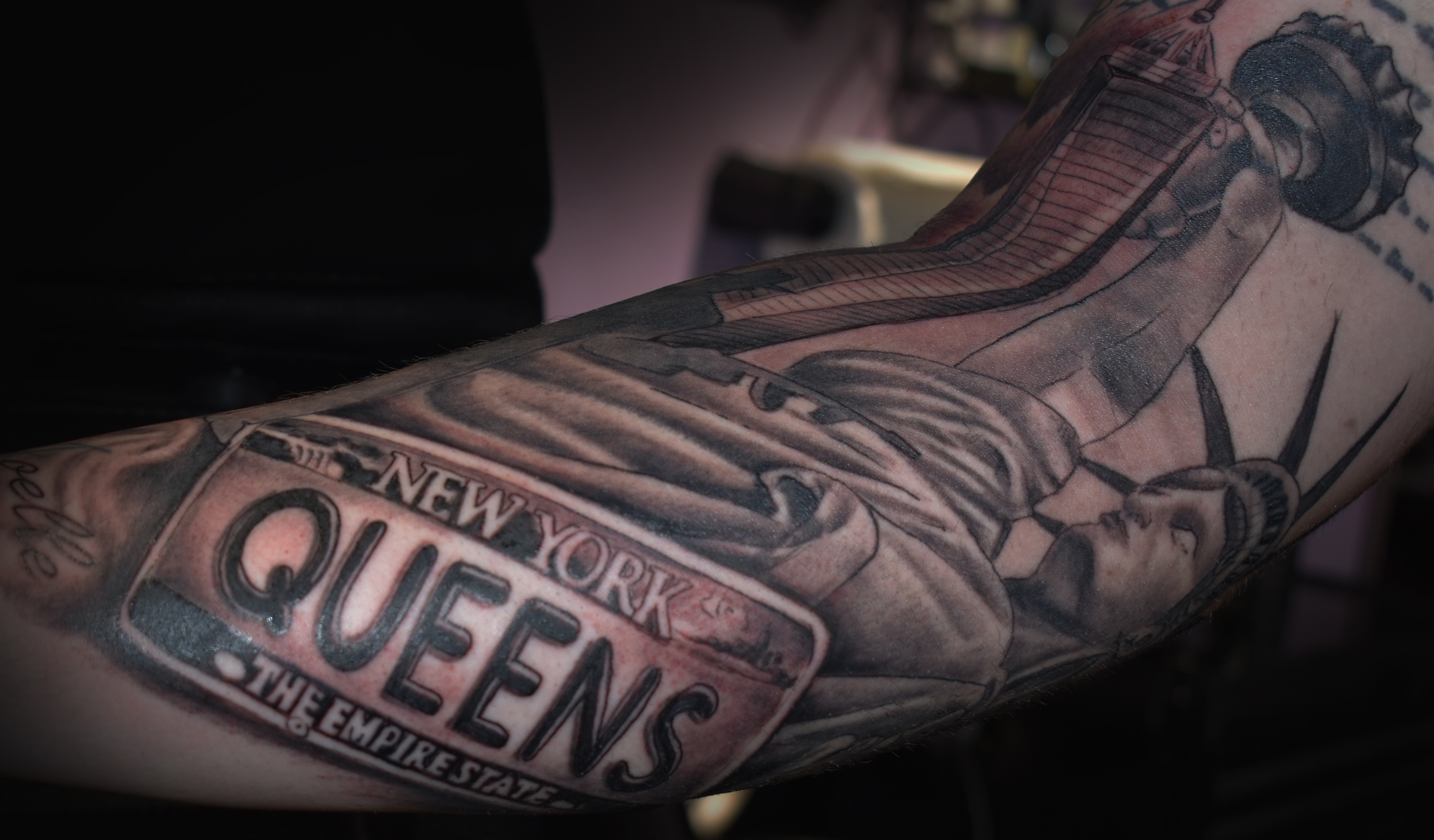 Queens NY plate tattoo